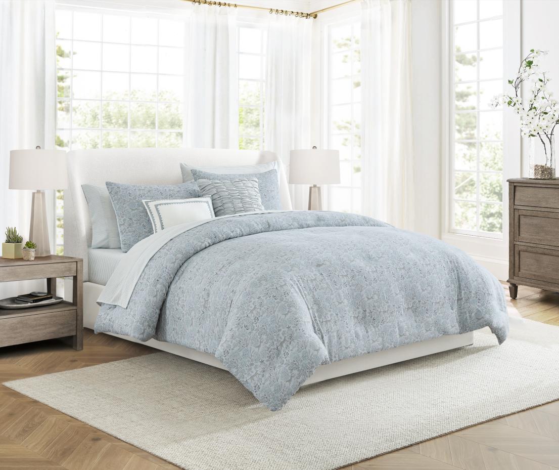 Blue bedding in bright room set